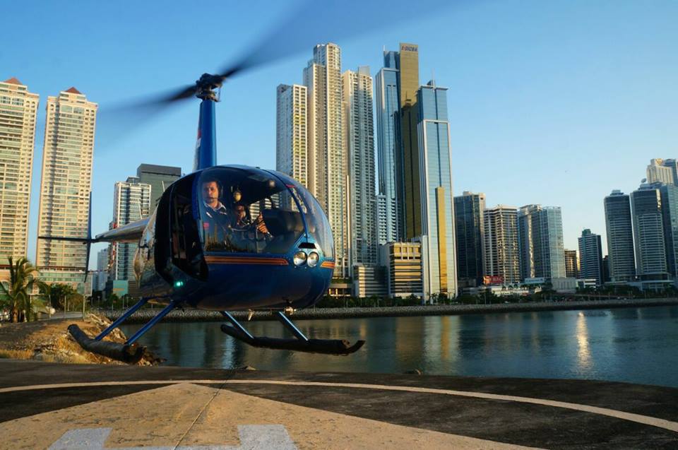 Helicopter flying over the Panama City skyline